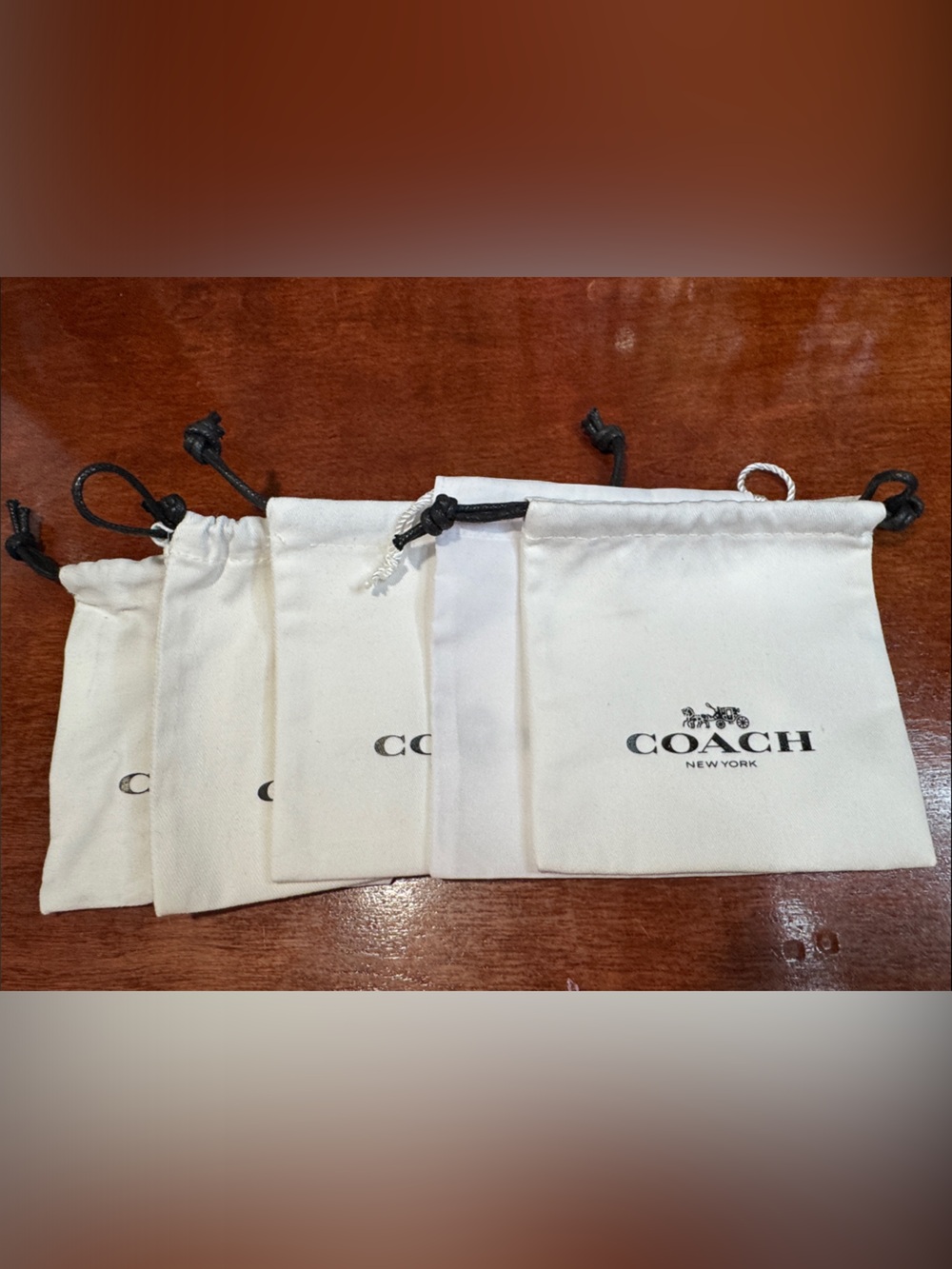 Coach Cream Drawstring Pouch Set with Black Drawcords